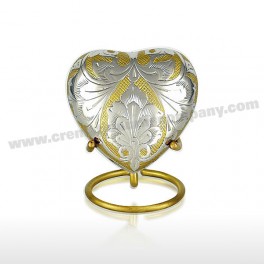 http://www.cremationurnscompany.com/1049-thickbox_default/gold-and-silver-3inch-heart.jpg