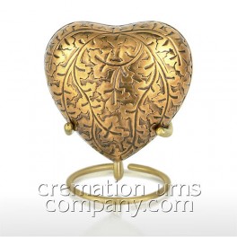 http://www.cremationurnscompany.com/1581-thickbox_default/autumn-gold-3inch-heart.jpg