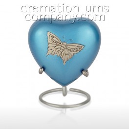 http://www.cremationurnscompany.com/1592-thickbox_default/pewter-butterfly-3inch-heart.jpg