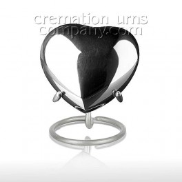 http://www.cremationurnscompany.com/1679-thickbox_default/silver-tear-3inch-heart.jpg