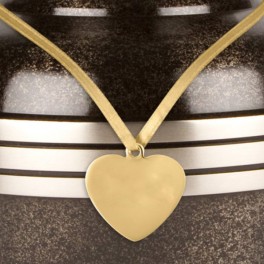 http://www.cremationurnscompany.com/856-thickbox_default/heart-shaped-brass-urn-medallion-.jpg